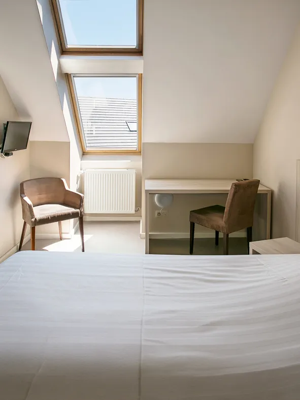 Une chambre de l’hôtel La Couronne